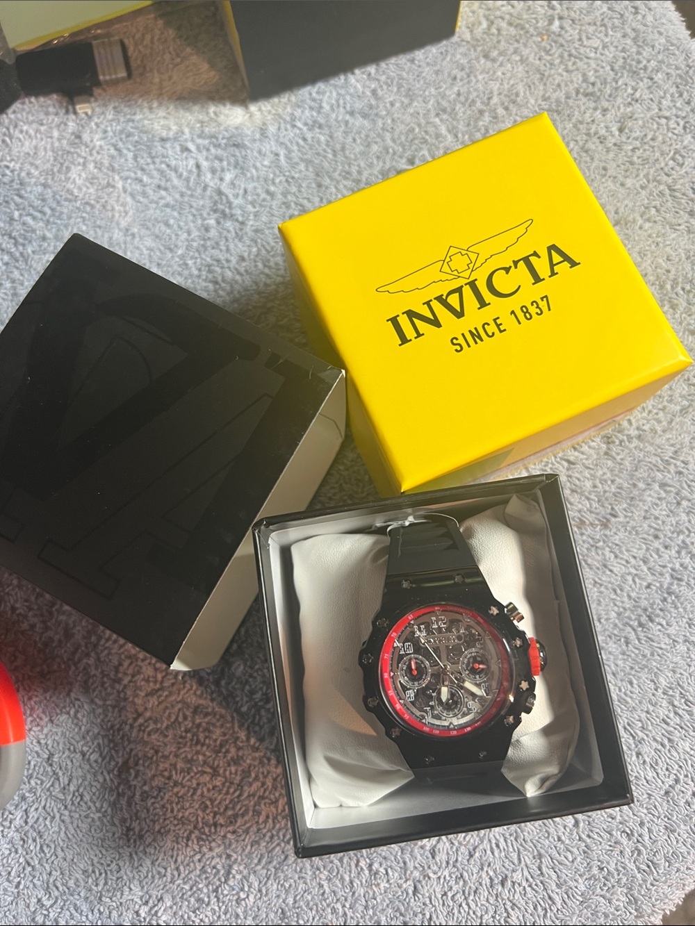 Invicta Black and Red Skeleton Chronograph Watch